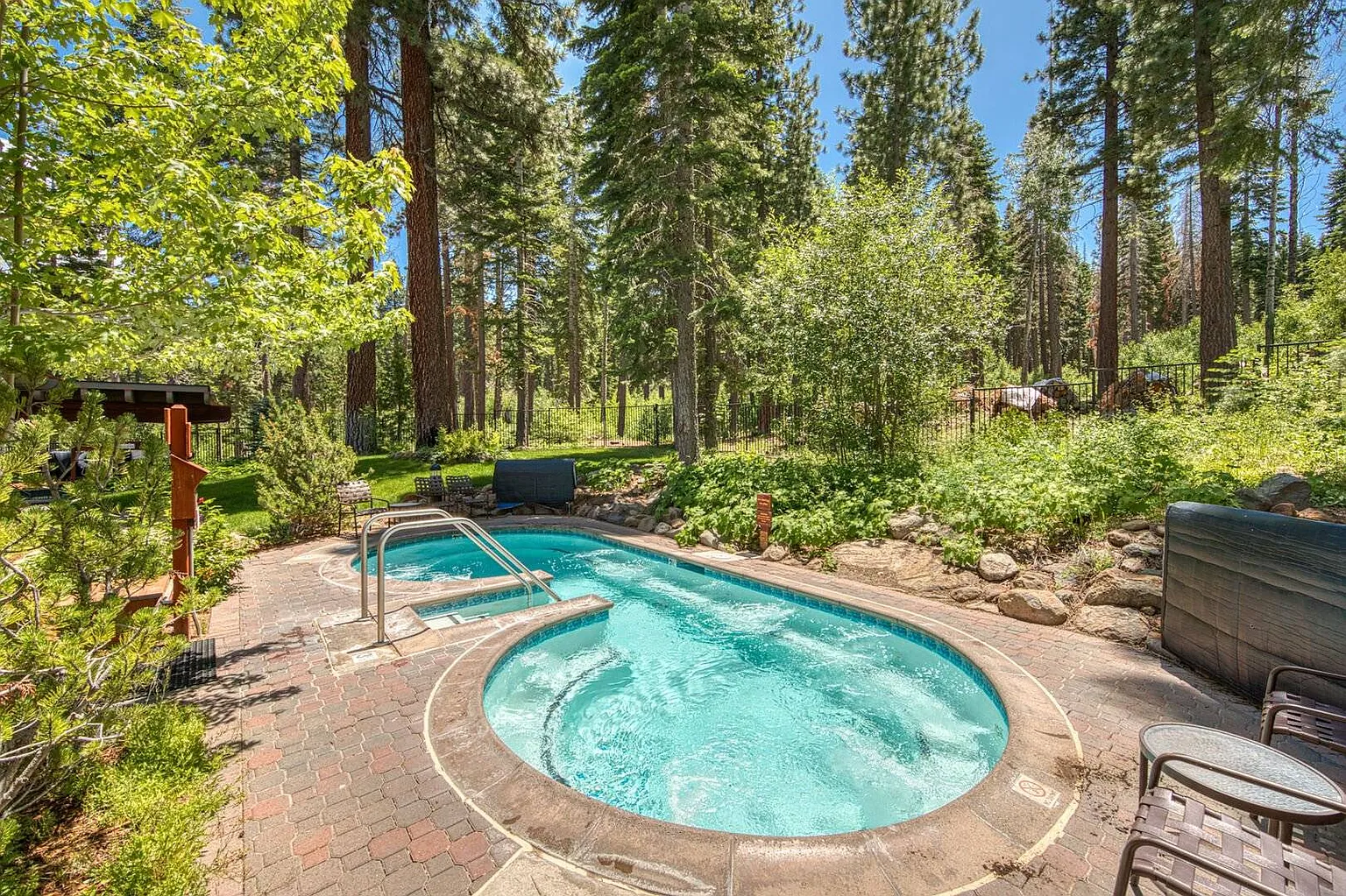 Northstar Recreation Center hot tub surrounded by forest